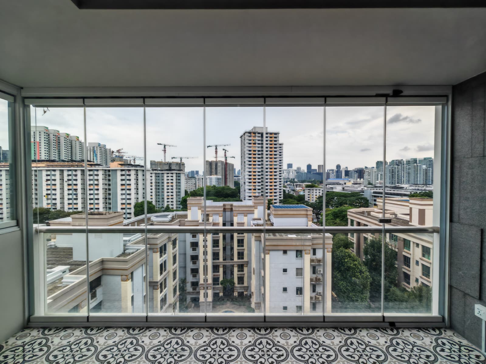 Completed GLASSVIEW Singapore project with clear glass panels installed across a residential opening.